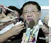 Taku Yamasaki, a senior Liberal Democratic Party member, speaks to reporters ... - nn20050728a3a