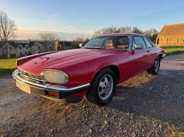 Image result for Grenadier Red 1987 Jaguar