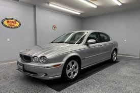 Image result for White Onyx 2002 Jaguar