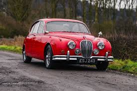 Image result for Carmen Red 1961 Jaguar