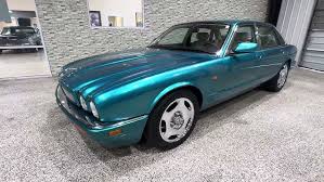 Image result for Bright Turquoise 1995 Jaguar