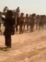 ISIS parade captured Kurds then behead one on video | Daily Mail.