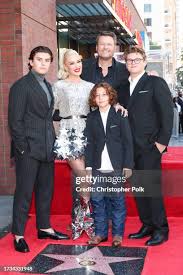 Image result for Queen B by Bumbleride $428 Gwen Stefani and Gavin Rossdale with Kingston and Zuma at the LA zoo