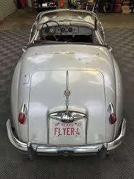Image result for Silver Gray 1959 Jaguar