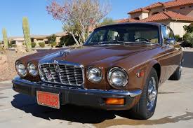 Image result for Carriage Brown 1977 Jaguar