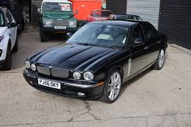 Image result for Black Cherry 2006 Jaguar