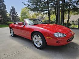 Image result for Phoenix Red 1999 Jaguar