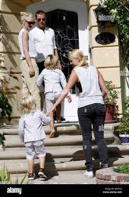 Image result for Queen B by Bumbleride $428 Gwen Stefani and Gavin Rossdale with Kingston and Zuma at the LA zoo