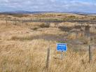 "Danger, soft ground, deep pools". Fenced off part of the moorland adjacent - via Daymix