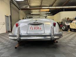 Image result for Silver Gray 1959 Jaguar