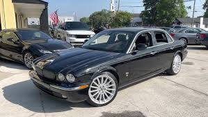 Image result for Black Cherry 2006 Jaguar