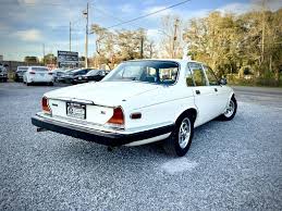 Image result for Nimbus White 1987 Jaguar
