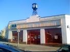 Vacant showroom with Art Deco clock, Macclesfield - via Daymix