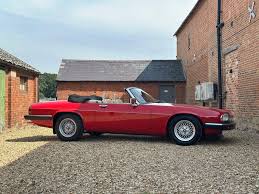 Image result for Grenadier Red 1987 Jaguar