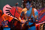 http://upload.wikimedia.org/wikipedia/commons/d/d2/Sufjan_Stevens_playing_banjo.jpg