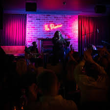 Image result for Selby Dominoe Club