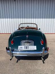 Image result for Dark Green 1959 Jaguar