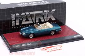 Image result for Bright Turquoise 1995 Jaguar