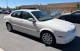 Image result for White Onyx 2002 Jaguar