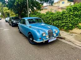 Image result for Light Blue 1968 Jaguar