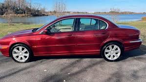Image result for Carnival Red 2003 Jaguar