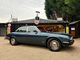 Image result for Dark Green 1959 Jaguar