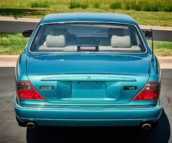 Image result for Bright Turquoise 1995 Jaguar