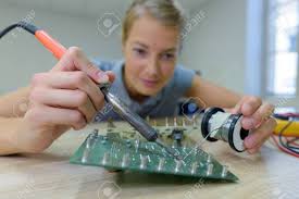 Image result for woman soldering