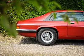 Image result for Grenadier Red 1987 Jaguar