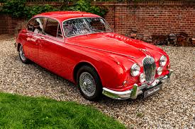 Image result for Cranberry Red 1983 Jaguar