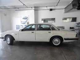 Image result for Glacier White 1988 Jaguar