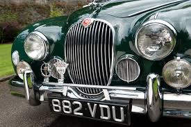 Image result for Dark Green 1959 Jaguar