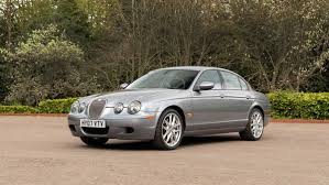 Image result for Winter Gold Pearl 2007 Jaguar