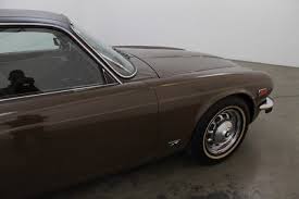 Image result for Carriage Brown 1977 Jaguar