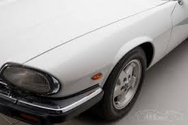Image result for Glacier White 1988 Jaguar