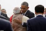 Barack Obama and First Lady Michelle arrive in India and pay.