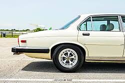 Image result for Nimbus White 1987 Jaguar