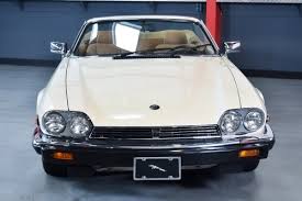 Image result for Nimbus White 1987 Jaguar