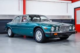 Image result for Poseidon Dark Green 1985 Jaguar