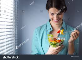Image result for women eating salad and smiling
