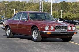 Image result for Grenadier Red 1987 Jaguar