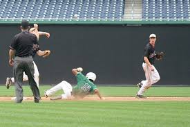 David Steinbach and Wes Roman try for a double-play with one out in the last inning ... - 20110605.1067