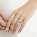Promise Oval Diamond Engagement Ring, Pear Shape Side Stone | Graff