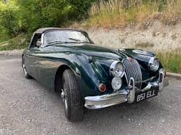 Image result for Dark Green 1959 Jaguar