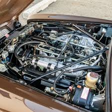 Image result for Carriage Brown 1977 Jaguar