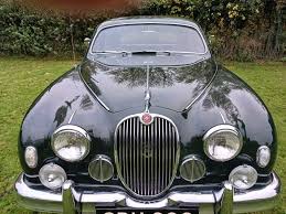 Image result for Dark Green 1959 Jaguar