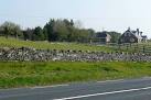 road towards a typical large house within commuting distance of Ennis. - via Daymix