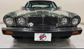 Image result for Poseidon Dark Green 1985 Jaguar