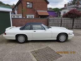 Image result for Glacier White 1988 Jaguar
