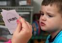 Jacob Day, 3, who is autistic, studies a flash card held by his ... - 070514_babyPsychiatry_hmed12p.grid-6x2